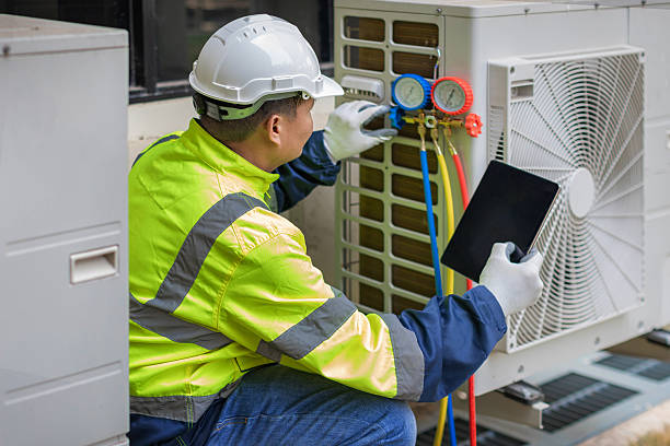Professional Air Conditioning Repair technician working in National Park, NJ